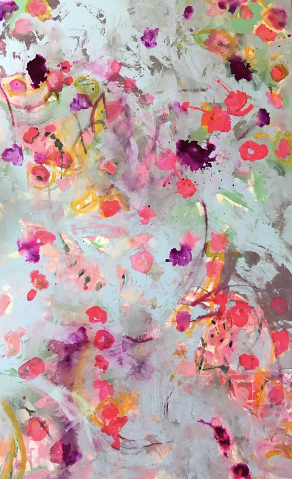 Close detail of reverse-painted LUCiTE in coral, magenta, and gold