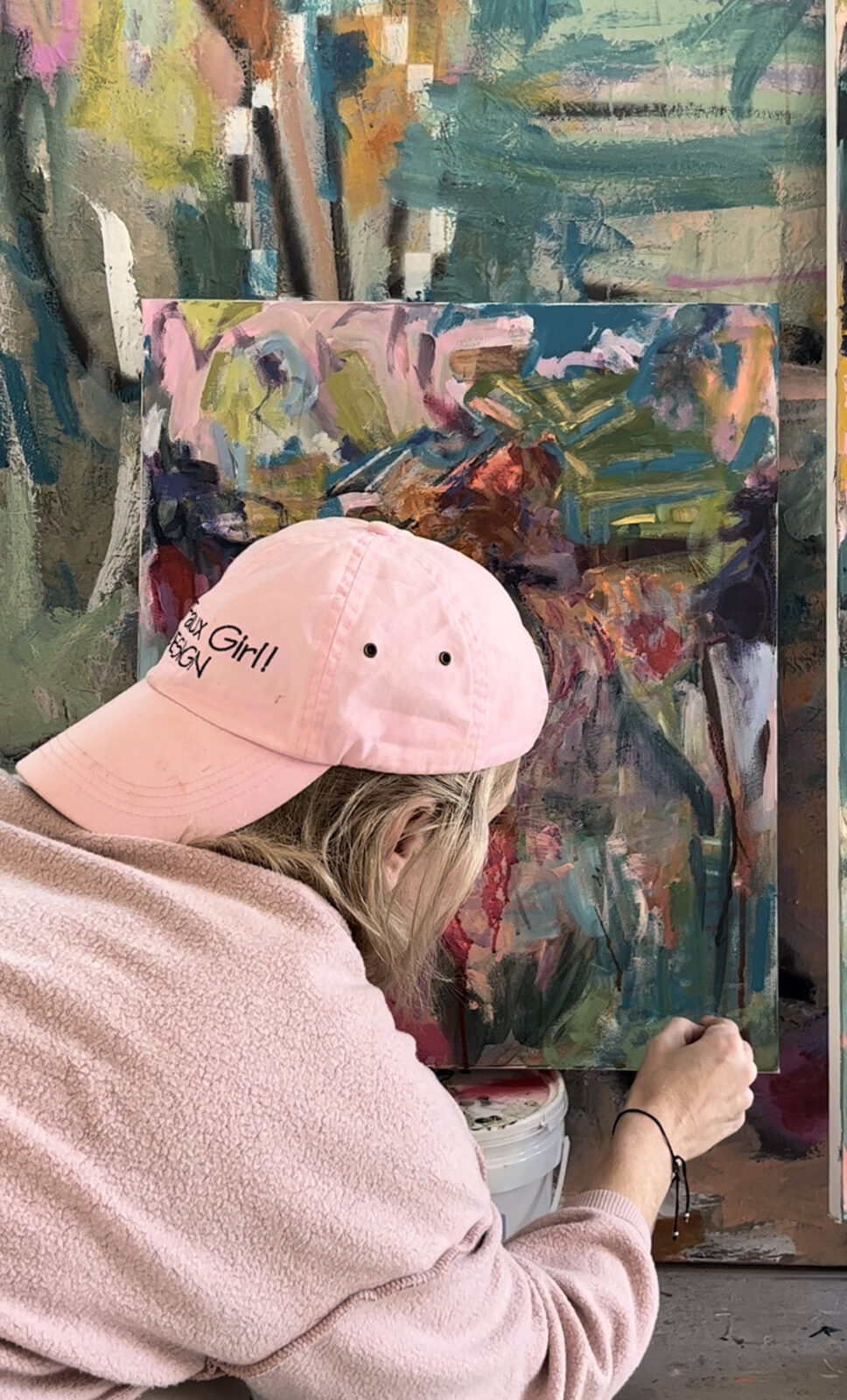 Summer Savin with an original canvas in the studio